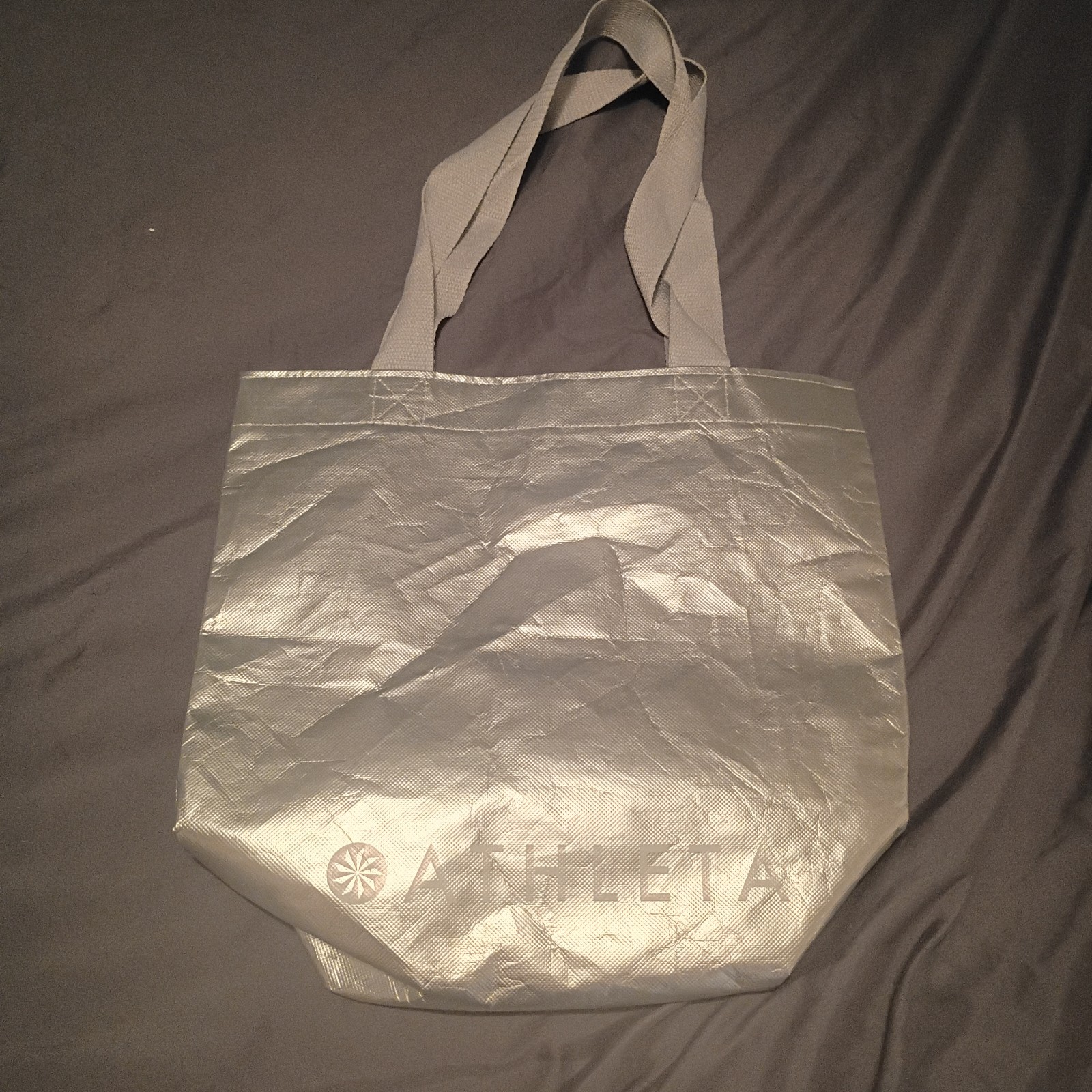 ATHLETA Metallic Silver Tote Reusable Clothes Shopping Bag With Handles