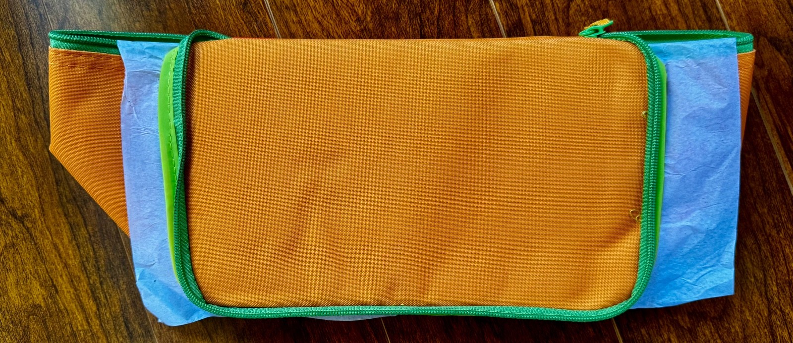 Trader Joes mini insulated sunny orange bag with green zipper