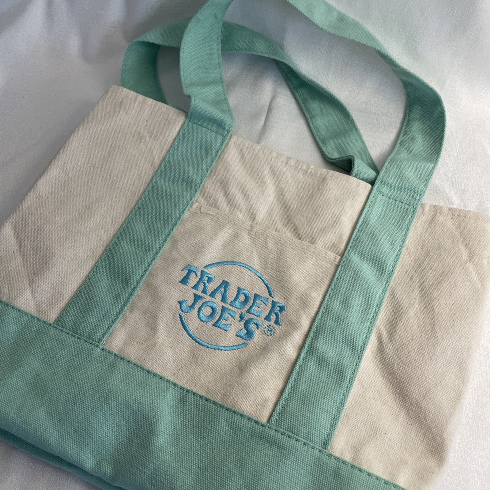 Trader Joe’s Mini Canvas Tote bag pastel green with blue embroidered logo