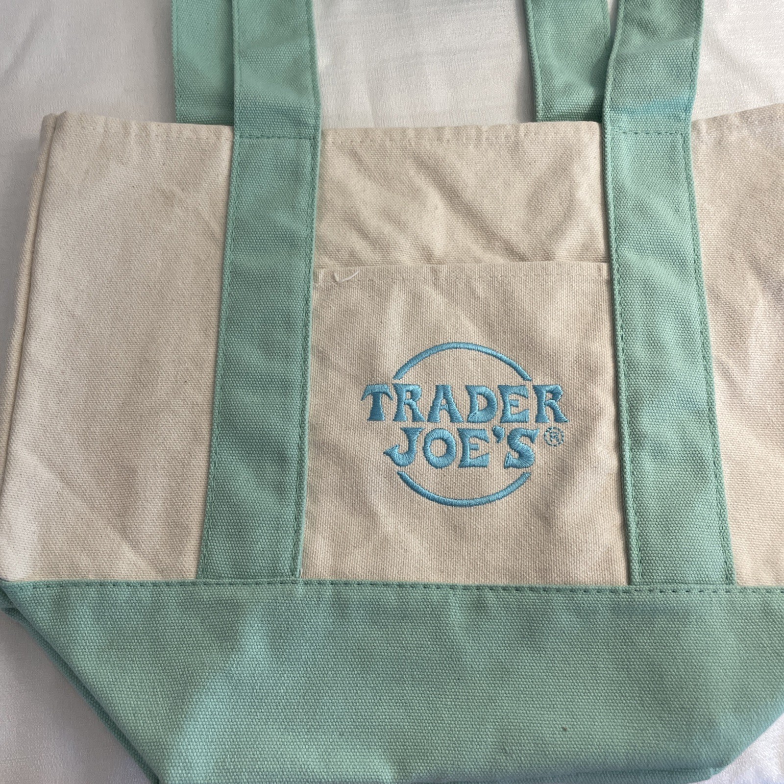 Trader Joe’s Mini Canvas Tote bag pastel green with blue embroidered logo