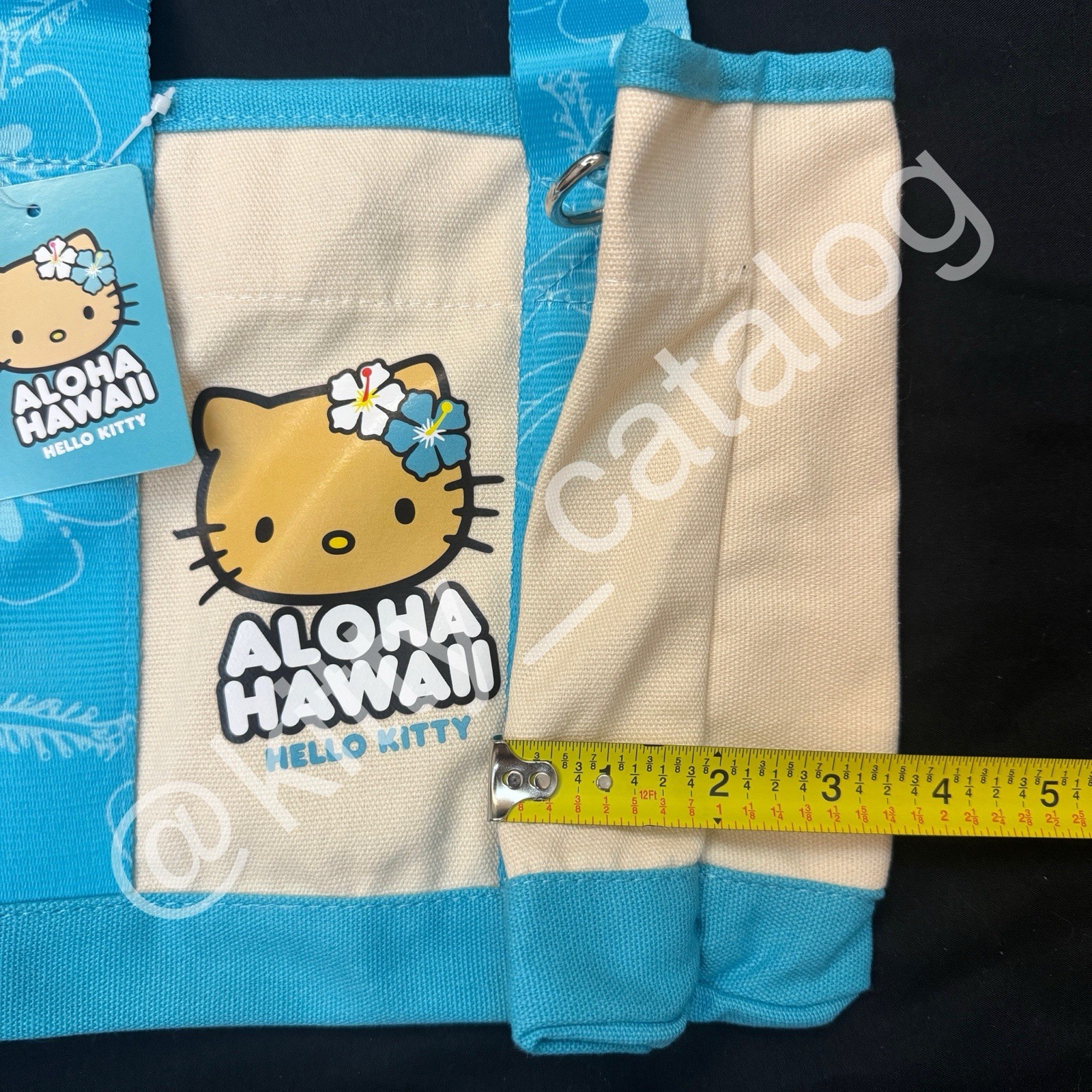 ABC Stores Hawaiʻi: Sun Tan Hello Kitty Big Face Mini Canvas Tote Bag, Blue