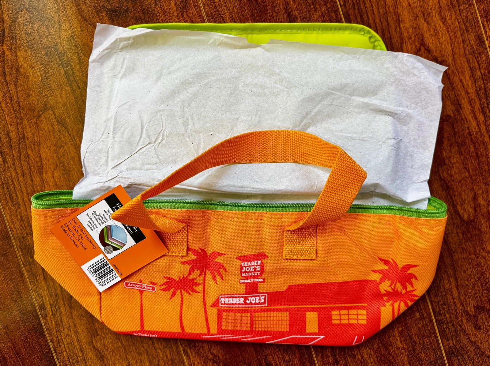 Trader Joes mini insulated sunny orange bag with green zipper