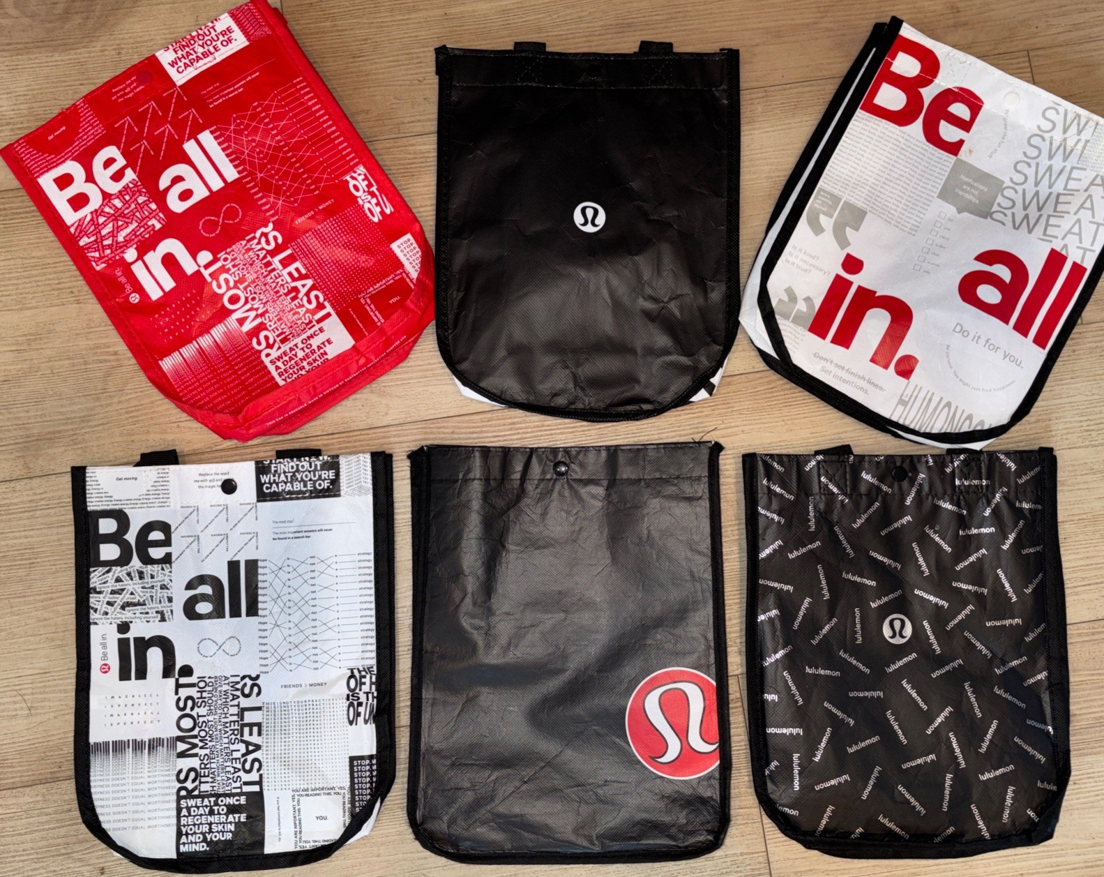 Lululemon 6 Tote bags in different patterns. Bag Small 12″ x 9″.