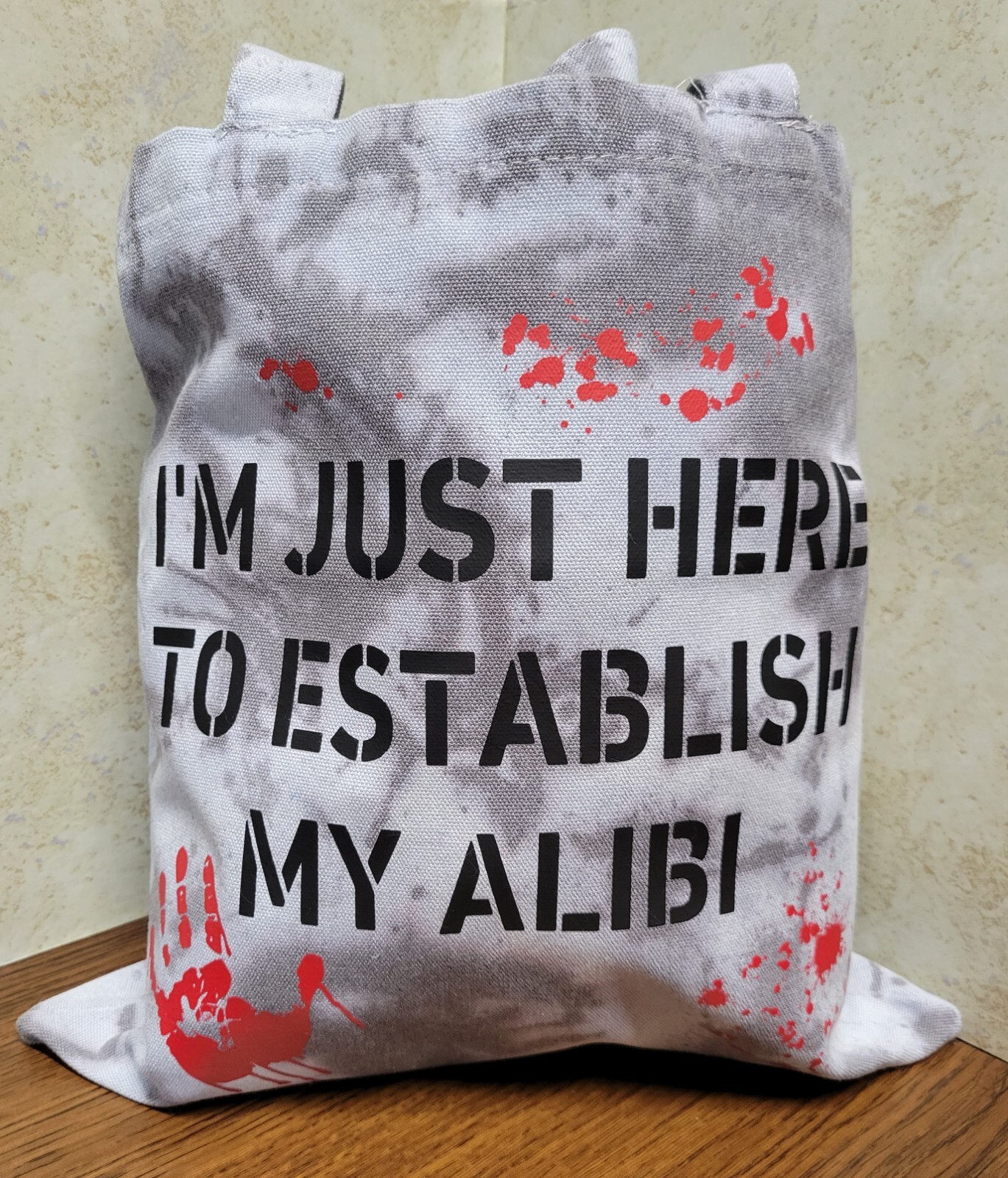 “I’M JUST HERE TO ESTABLISH MY ALIBI” Canvas Tote Bag, 13.5″x13.5″