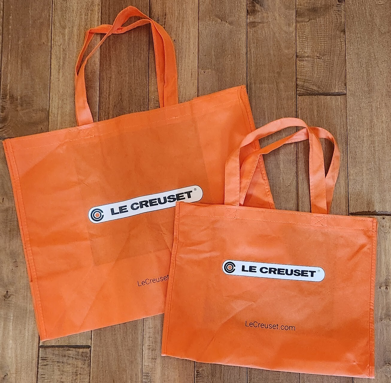 LE CREUSET Set of 2 Orange Cloth Reusable Shopping Gift Totes Large Medium Bags