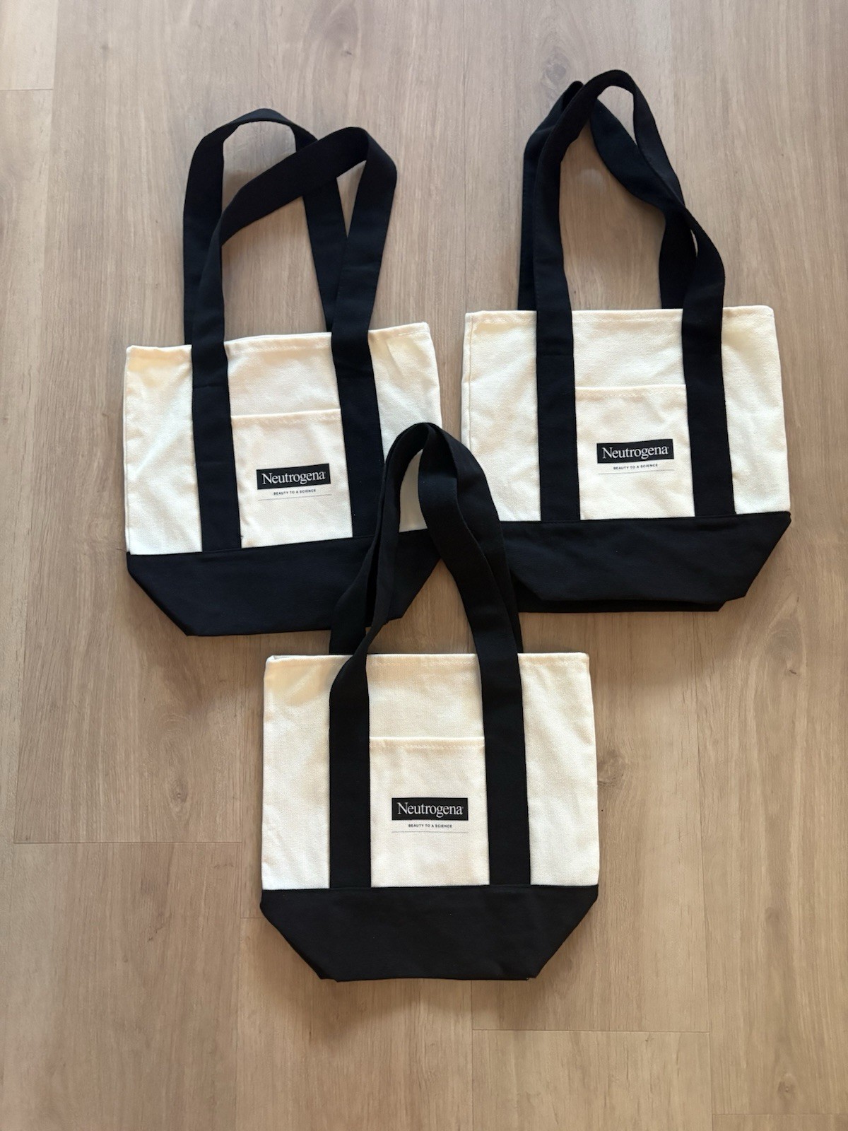 3 Neutrogena Cream And Black Totes (Brand New, Didn’t Come With Tags)