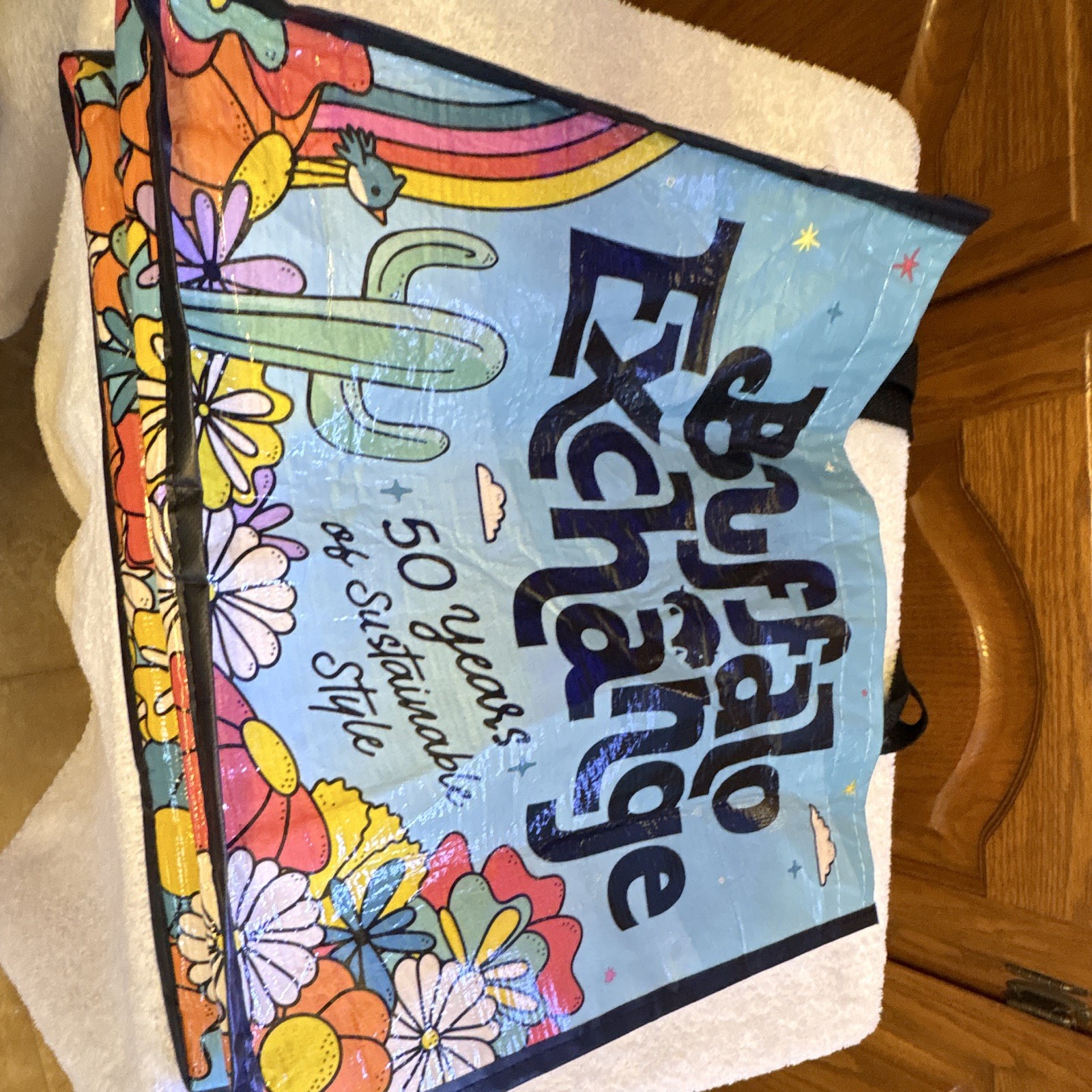 Buffalo Exchange 50 Years Reusable Plastic Tote Bag Blue Floral Multicolor 16″