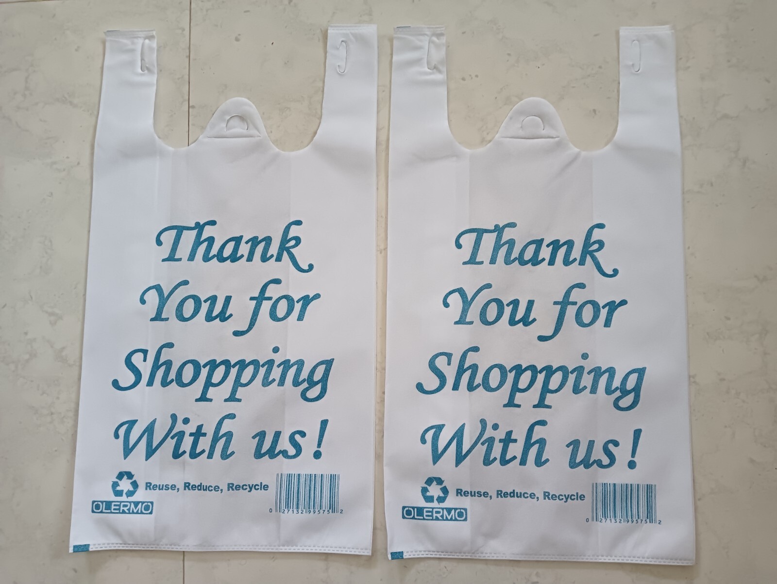 Olermo W Cut Non Woven Shopping Bag || 12 x 7 x 22 in || Pack of 12000 Bags ||